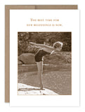 The cover of the "New Beginnings Now Encouragement Card" by Shannon Martin Design features a sepia-toned image of a woman in a vintage swimsuit, ready to dive off a rock into water. Crafted from recycled paper, the card displays the text, "The best time for new beginnings is now.
