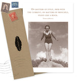 The Stand Like A Rock Encouragement Card by Shannon Martin Design features a sepia vintage photo of a woman in a retro swimsuit, a Thomas Jefferson quote, and comes with a brown envelope and vintage stamps. Made in the USA.
