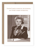 The Mind My Own Business Birthday Card by Shannon Martin Design features a vintage-style image of a smiling woman with a telephone, notepad, and pen, plus the text: I know I should mind my own business, but yours is more interesting. Made in the USA.