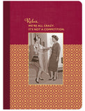 The Were All Crazy Journal by Shannon Martin Design features a vintage photo of two women laughing on a red and yellow background. The softcover notebook reads: Relax. We’re all crazy. It’s not a competition.