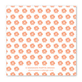 The What Time? Napkin by Shannon Martin Design is a white square beverage napkin with a repeating pattern of small orange sunbursts and the text © SHANNON MARTIN DESIGN and shannonmartindesign.com at the bottom center.