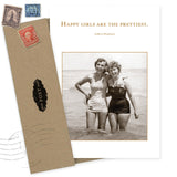 The Happy Girls Birthday Card by Shannon Martin Design has a sepia photo of two women in vintage swimsuits at the beach and the quote “Happy girls are the prettiest.” Includes an envelope made from recycled paper with stamp design.