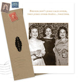 The Judge Other People Birthday Card by Shannon Martin Design features three smiling women with drinks and the text, “Friends don’t judge each other, they judge other people…together.” Includes envelope, vintage stamps. Made in USA from recycled paper.