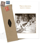 The "Time Precious What A Hoot Card" by Shannon Martin Design features a vintage photo of three women by a canoe with the quote "Time is precious, waste it wisely." Includes a brown envelope with old stamps—ideal for recycled paper card fans.
