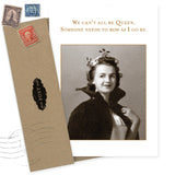 The Be Queen Birthday Card by Shannon Martin Design features a vintage photo of a confident woman in a cape and floral headpiece and reads, "We can’t all be Queen. Someone needs to bow as I go by." Includes brown recycled envelope.