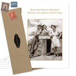 The Great Adventures Birthday Card by Shannon Martin Design features a vintage photo of three women smiling by a Glacier Vista Elev. 6000 sign, paired with the message: "Life was meant for good friends and great adventures.
