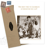 The Celebrate Whenever Congratulations Card by Shannon Martin Design features three people celebrating at a table with streamers and drinks. The recycled paper card reads, "The best time to celebrate is whenever you can!" Envelope with vintage stamps included.