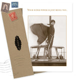 The "Your Super-Power Birthday Card" by Shannon Martin Design features a vintage woman on a boat with a cape and the message, "Your super power is just being you." Comes with two envelopes and is made from recycled paper.