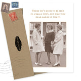 The Small Town Birthday Card by Shannon Martin Design features a sepia vintage photo of three women in coats and the caption, “There isn’t much to be seen in a small town, but what you hear makes up for it,” plus a recycled paper envelope with old stamps.