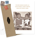 The All Your Stories Birthday Card by Shannon Martin Design features a sepia photo of two smiling girls with an open book and the message: "A good friend knows all your stories. A best friend helps you write them." Envelope included.