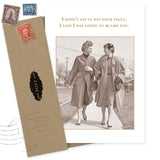 The Blame You Birthday Card by Shannon Martin Design features a sepia vintage photo of two women, witty text, is printed on recycled paper, and comes with an envelope and vintage stamps.