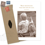 The Love of a Cat Friendship Card by Shannon Martin Design features a sepia vintage photo of a child and cat, with the quote "What greater gift than the love of a cat." Includes envelope with vintage stamps; ideal as a blank greeting card.