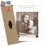 The One Loyal Friend Friendship / Just Because Card by Shannon Martin Design features a sepia photo of a woman hugging her dog and the quote, "One loyal friend is worth ten thousand relatives." Includes brown envelope with vintage stamps.