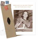 A sepia photo of a woman shaking a cocktail behind a bar, with the text: Some people call me crazy. I prefer the term ‘happy with a twist.’ Beside it is the Happy With A Twist Birthday Card by Shannon Martin Design, decorated with vintage stamps.