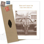 The A True Classic Birthday Card by Shannon Martin Design features a sepia photo of someone in vintage clothes with a classic car and the phrase, “They don’t make ’em like they used to.” Includes brown envelope with old stamps. Made in USA.