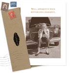 The Rock Bottom Basement What A Hoot Card by Shannon Martin Design features a vintage photo of a glum woman before an old car and reads, “Well, apparently rock bottom has a basement.” Includes envelope with old stamps—great as a blank greeting card.
