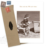 The "You and Me. We Got This." Friendship Card by Shannon Martin Design features a vintage photo of kids pulling a rowboat, comes with a brown envelope and vintage stamps—ideal for fans of recycled paper cards.