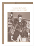 In a nostalgic scene, a woman dressed in vintage fashion, with a fur coat and hat, smiles and waves as she sits on luggage crafted from recycled paper. Above her are the words: "I do believe it‚Äôs time for another adventure!" Featured on the beautiful Another Adventure Friendship / Just Because Card by Shannon Martin Design.