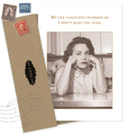 A sepia-toned vintage photo on the Shannon Martin Design Life Coach Birthday Card shows a woman looking disappointed, with text above: “My life coach just informed me I didn’t make the team.” An envelope with vintage stamps is beside the card.