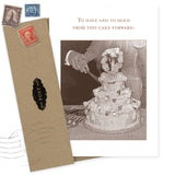 The This Cake Forward Wedding Card by Shannon Martin Design features a sepia-toned couple cutting a cake with the message "To have and to hold from this cake forward." Vintage stamps decorate the envelope. Made in the USA.