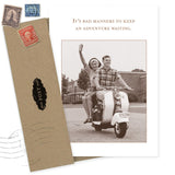 The Shannon Martin Design Adventure Waiting Birthday Card is printed on recycled paper and shows a smiling couple on a scooter with the message, "It's bad manners to keep an adventure waiting." Includes envelopes and vintage stamps.