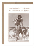 The Looks Aren't Everything Birthday Card by Shannon Martin Design features a sepia photo of a woman in a vintage swimsuit with a witty caption‚Äîperfect for a unique vintage birthday greeting.