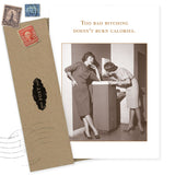 The "Too Bad Birthday Card" by Shannon Martin Design features a vintage photo of two women chatting, witty text on top, is printed on recycled paper, and comes with a brown envelope adorned with old stamps.