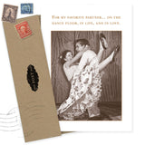 The Shannon Martin Design "Favorite Partner Love Card" features a sepia photo of a dancing couple and reads: “For my favorite partner... on the dance floor, in life, and in love.” Includes an envelope with vintage-style stamps.