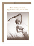The Some People Just Shine Congratulations Card by Shannon Martin Design features a sepia photo of a smiling woman in a vintage swimsuit, holding up a scarf in tall grass, with the message: Some people just shine. Perfect for any occasion.