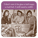 Three stylish women sit at a bar with drinks on Glass Half Full Coasters by Shannon Martin Design; text: "I still need a refill.