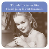 A woman in retro attire smiles with a cocktail. Above her: “This drink tastes like I'm not going to work tomorrow”—a playful touch from the Not Going To Work Coaster by Shannon Martin Design, perfect as a cork-backed gift for any fun-loving hostess.