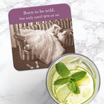 The Born To Be Wild Coaster by Shannon Martin Design features a retro photo of a woman in a frilly dress and the text "Born to be wild, but only until 9PM or so." Cork-backed, heat and water resistant.