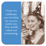 A woman in a party hat raises a cocktail by balloons, with retro décor. Text: “I hope you celebrate your birthday the way you came into this world, naked and screaming.” Into This World Coaster by Shannon Martin Design.