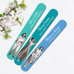 The Being Happy Emery Boards by Shannon Martin Design include three colorful vintage files featuring retro women, uplifting quotes like “Life is better when you’re laughing,” and charming blossoms beside each board.