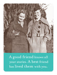 Two women in vintage coats smile together by old lockers. Caption: “A good friend knows all your stories. A best friend has lived them with you.” Best Friend Magnet by Shannon Martin Design.