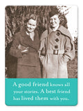 Two women in vintage coats smile together outdoors. Caption: A good friend knows all your stories. A best friend has lived them with you. Best Friend Magnet by Shannon Martin Design—perfect for gifts or vintage photo magnet collectors.