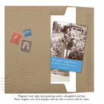 A brown envelope holds a black-and-white photo card from Shannon Martin Design’s "To Plant A Garden Magnet," featuring a woman gardening and the Audrey Hepburn quote: “To plant a garden is to believe in tomorrow.” Ideal for gifting or fridge display.