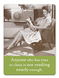 A woman in vintage attire relaxes by a retro air conditioner, smiling at her magazine. The Shannon Martin Design "Reading Enough Magnet" is perfect for vintage photography or as a fun gift magnet!.