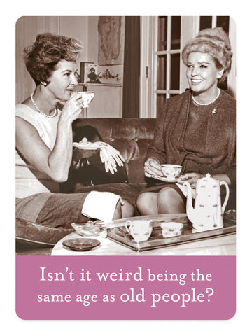 Two women in vintage clothing enjoy tea, smiling with a humorous caption that reads, Isnt it weird being the same age as old fridges? Presented in sepia tones for a retro look. Featured on the Same Age Magnet by Shannon Martin Design.