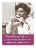 A woman with dark hair sips from a teacup, staring at the camera. Text below: The older I get, the more I understand why roosters scream to start their day. Add humor to your fridge with the Roosters Magnet by Shannon Martin Design.