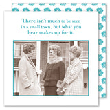 Three women in vintage coats chat and smile outside a building, each holding drinks with Shannon Martin Design’s Small Town Napkin. Overhead, the text reads: “There isn’t much to be seen in a small town, but what you hear makes up for it.”.