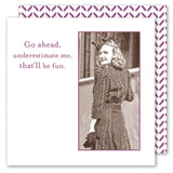 The "Go Ahead Me Napkin" by Shannon Martin Design features a sepia photo of a smiling woman in a patterned dress with a bow, looking over her shoulder. The napkin reads: Go ahead, underestimate me, that’ll be fun. Pair with vintage cards for extra charm.