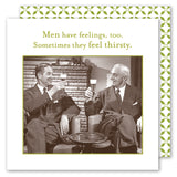 Two men in suits smile and raise beer glasses by the fire atop vintage napkins. "Men have feelings, too. Sometimes they feel thirsty." Features a green patterned border. Men Have Feelings Napkin by Shannon Martin Design.