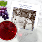 The If We Get Caught Napkin by Shannon Martin Design features a vintage photo of two smiling women with the text, "Okay, if we get caught, here’s the story..." alongside a glass of red wine and purple grapes.