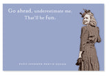 A vintage styled image featuring a smiling woman wearing a patterned dress with her hand on her hip, set against a blue background with the text: "Go ahead, underestimate me. That'll be fun." This perfect blend of witty sentiment and timeless charm comes from the ¬©2023 Go Ahead Sticky Note by Shannon Martin Design.