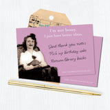 The Not Bossy Sticky Note by Shannon Martin Design features a vintage black-and-white image of a smiling girl with a rose, witty text ("I'm not bossy, I just have better ideas"), plus sticky notes, a pen, and a reminder ticket in the scene.