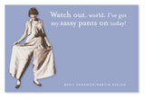 A woman playfully holds out the sides of her wide pants while smiling. The text reads, "Watch out, world. I've got my Sassy Pants Sticky Note from Shannon Martin Design on today!" It's like humor stickies brought to life against a blue background.