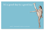 A smiling woman kicks one leg high on the A Good Day Sticky Note by Shannon Martin Design, featuring witty sentiments and ‚ÄúIt‚Äôs a good day for a good day!‚Äù against a blue background. ¬©2021 Shannon Martin Design.