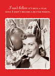 The Better Person Holiday Card by Shannon Martin Design features a vintage photo of a smiling woman in a party hat with the text: I cant believe its been a year since I didnt become a better person. Printed on recycled paper in the USA.