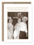 Introducing the "Your Kind Of Crazy Birthday Card" by Shannon Martin Design: This card features a vintage-style sepia-toned photo of three smiling people. The centerpiece figure wears a balloon hat, and the person on the right dons a flower headpiece. Above them, the text reads, "Life is all about finding people who are your kind of crazy." Printed on recycled paper for an added vintage feel, it's perfect for birthday cards.